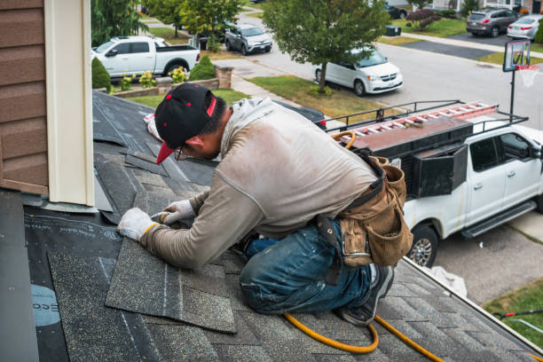 Professional Roofing technician working in Huntsville, IL